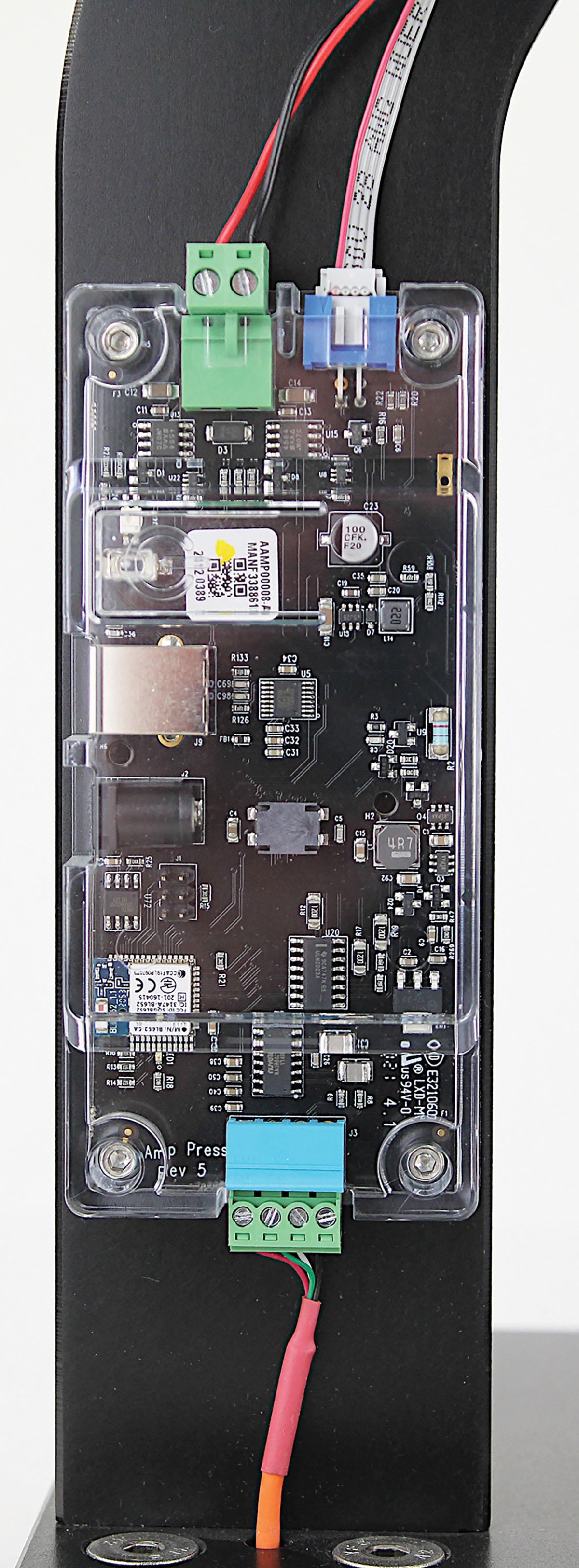 The tidy electronics package is mounted on the back of the press. The lower wiring runs down to the load cell, the upper wiring to the ram motor.